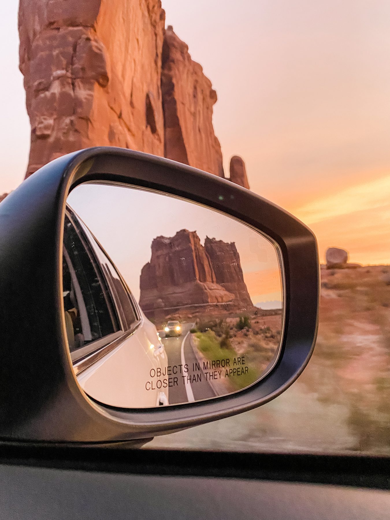 Grand canyon in the review mirror of a car