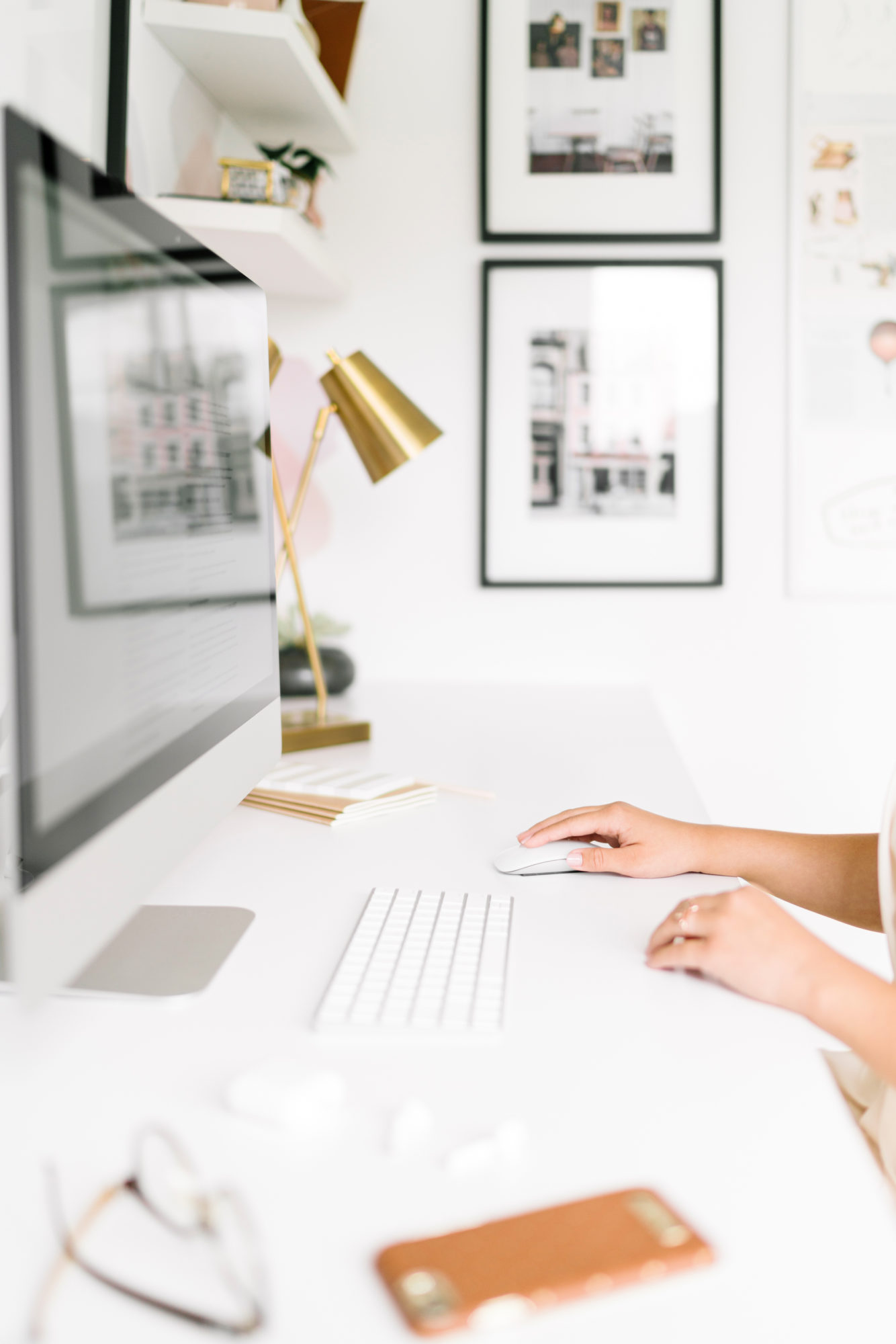 woman working at desk on computer