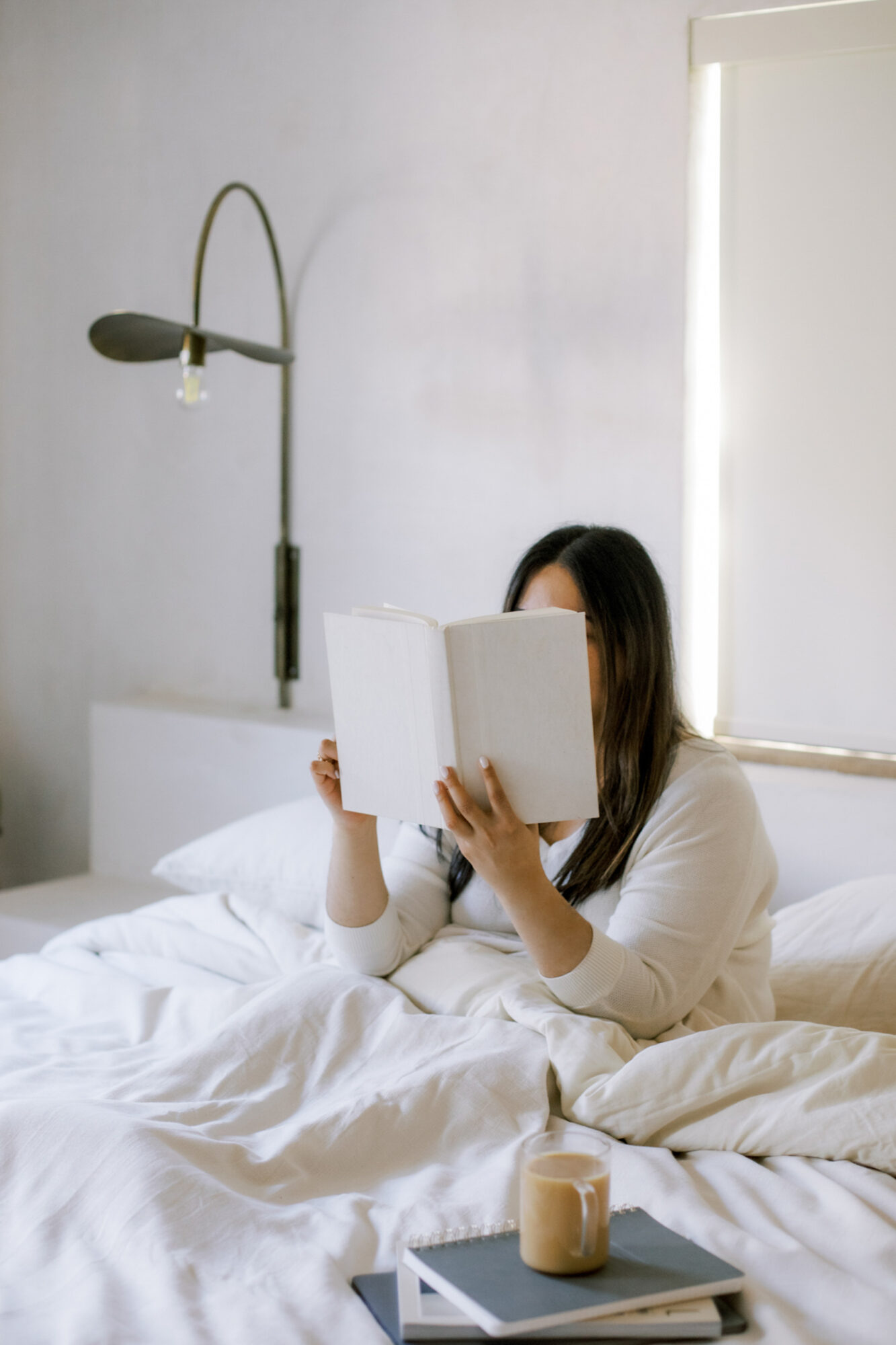 women reading in bed